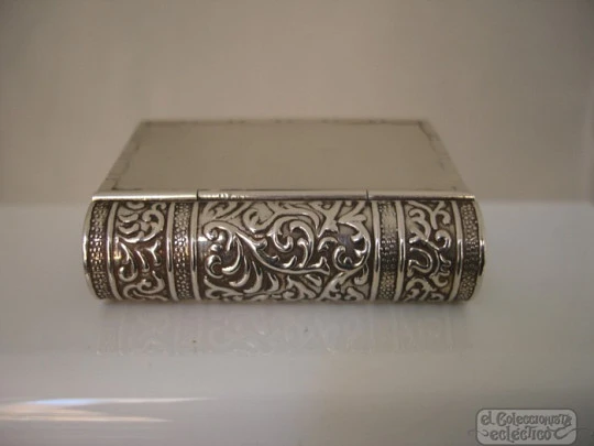 Book pillbox. Silver. 1970's. Scrolls and geometric motifs