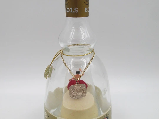 Botella musical bailarina. Destilería Lucas Bols. Cuerda manual. Holanda. 1950