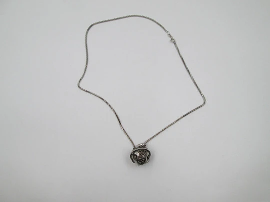 Braided chain with decorated sphere bell pendant. Sterling silver. Italy. 1990's Braided chain with decorated sphere bell pendant. Sterling silver. Italy. 1990's