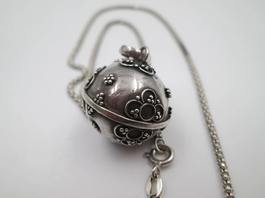 Braided chain with decorated sphere bell pendant. Sterling silver. Italy. 1990's Braided chain with decorated sphere bell pendant. Sterling silver. Italy. 1990's