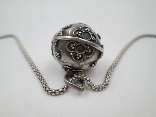 Braided chain with decorated sphere bell pendant. Sterling silver. Italy. 1990's Braided chain with decorated sphere bell pendant. Sterling silver. Italy. 1990's