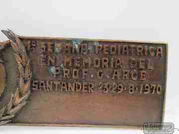 Bronze emblem. C. Arce teacher. First Week Pediatric. 1970