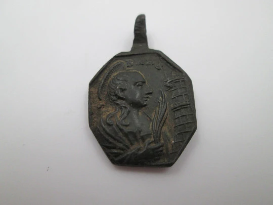 Bronze medal. Our Lady of Bethlehem and Saint Barbara. 18th century. Spain