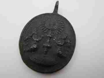 Bronze medal. Saint Isidore the Farmer and Chalice Eucharist. 18th century