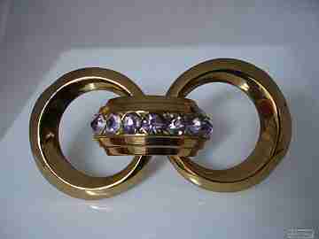 Brooch Coro. Golden metal. 1950's. Violet stones. USA
