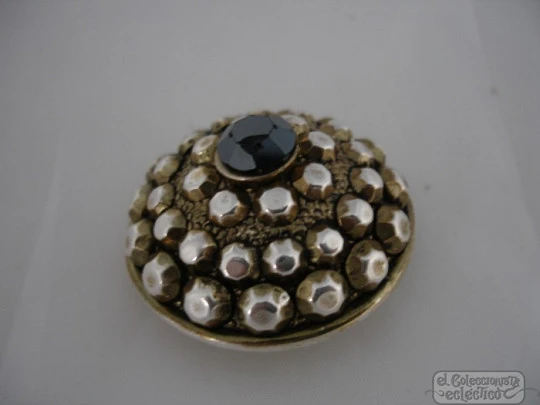 Brooch. Golden and silver metal. Black stone. 1970's. Hexagons