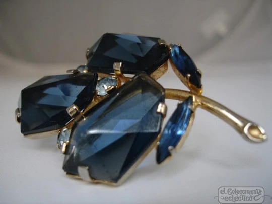 Brooch. Golden metal. Blue faceted stones. Flower. 1960's