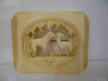 Brooch. Ivory. Openwork design. Dogs motifs. 1920's. Filigree