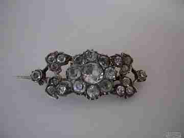 Brooch. Silver and white stones. 1920's. Leaves and flower. Europe
