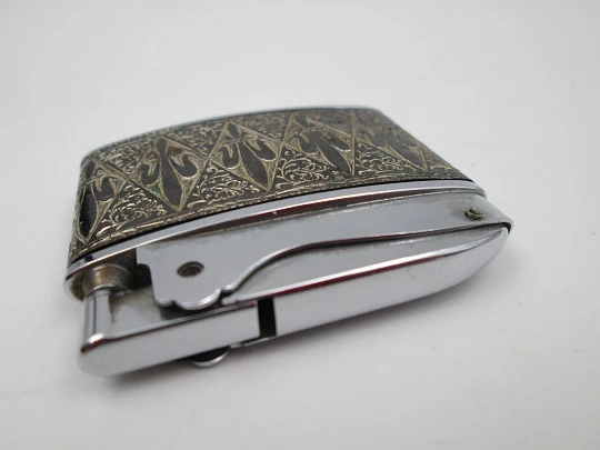 Brother-Lite pocket petrol lighter. Chromed plated. Fleurs-de-lis and vegetal motifs. 1950's