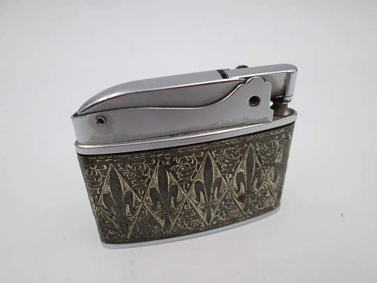 Brother-Lite pocket petrol lighter. Chromed plated. Fleurs-de-lis and vegetal motifs. 1950's