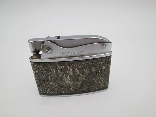 Brother-Lite pocket petrol lighter. Chromed plated. Fleurs-de-lis and vegetal motifs. 1950's