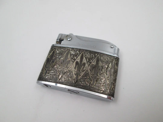 Brother-Lite pocket petrol lighter. Chromed plated. Fleurs-de-lis and vegetal motifs. 1950's