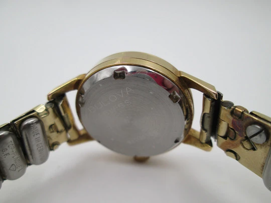 Bulova lady wristwatch. Manual winding. Steel and gold plated. Bracelet. 1960's