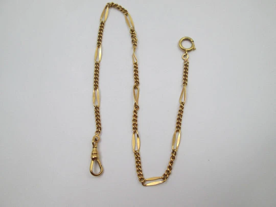 Cadena reloj de bolsillo. Metal chapado oro. Eslabones y espirales. Cierre argolla. 1970