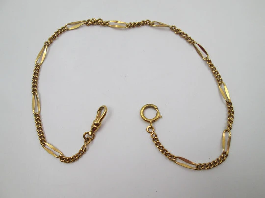 Cadena reloj de bolsillo. Metal chapado oro. Eslabones y espirales. Cierre argolla. 1970