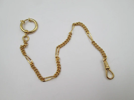 Cadena reloj de bolsillo. Metal chapado oro. Eslabones y ochos. Argolla y mosquetón. 1980