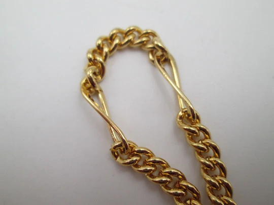 Cadena reloj de bolsillo. Metal chapado oro. Eslabones y ochos. Argolla y mosquetón. 1980