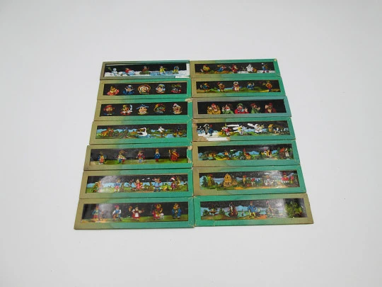 Caja 14 cristales linterna mágica. Escenas infantiles a color. Estuche. Alemania. 1900