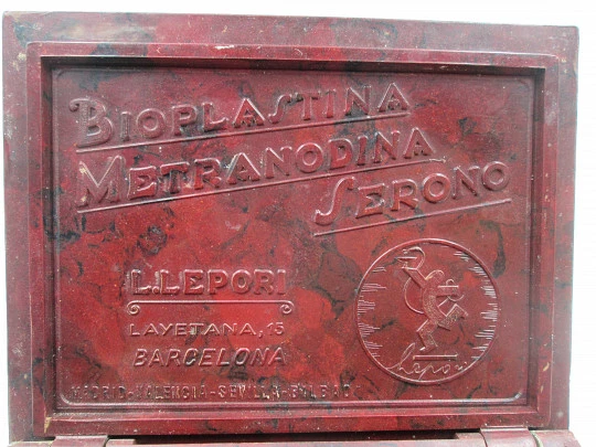 Caja publicitaria Lepori para escritorio y despacho. Baquelita granate. Rentería, 1940