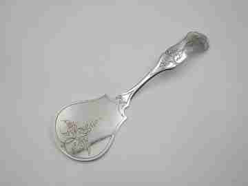 Cake shovel. Silver plated metal. Floral and vegetable motifs. England. 1930's