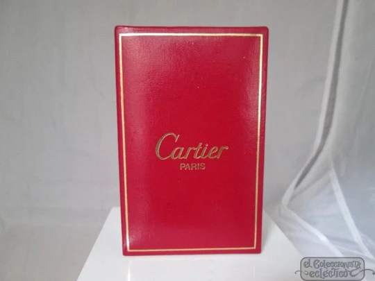 Cartier butane lighter. Rhomboid decoration. Gold plated. Box