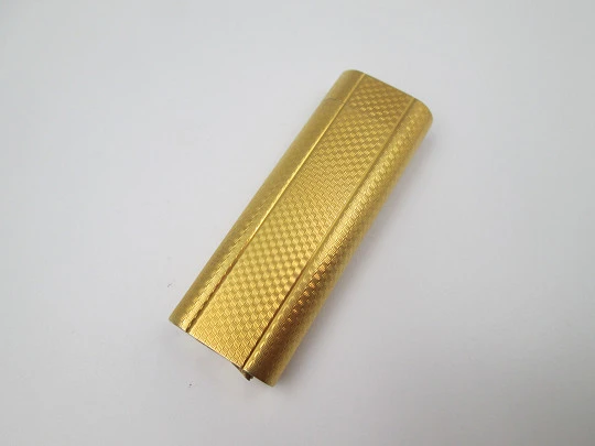 Cartier butane lighter. Yellow rolled gold. Waves pattern. Original box. France. 1990's