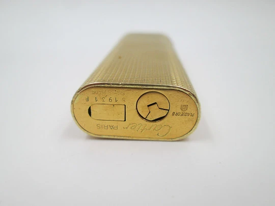 Cartier Paris butane lighter. Rhomboid decoration. Rolled gold. Swiss. 1990's