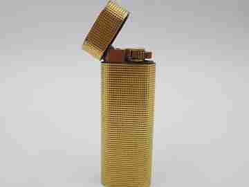 Cartier Paris butane lighter. Rhomboid decoration. Rolled gold. Swiss. 1990's