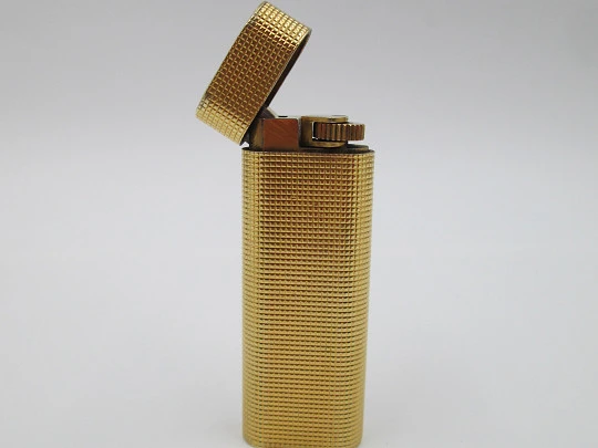 Cartier Paris butane lighter. Rhomboid decoration. Rolled gold. Swiss. 1990's