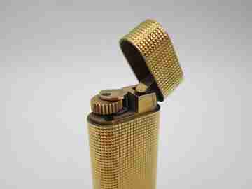 Cartier Paris butane lighter. Rhomboid decoration. Rolled gold. Swiss. 1990's