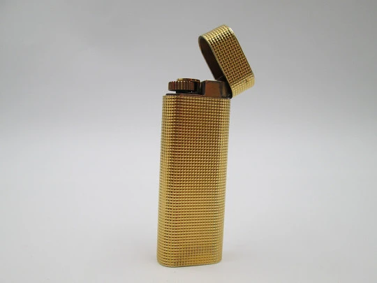 Cartier Paris butane lighter. Rhomboid decoration. Rolled gold. Swiss. 1990's