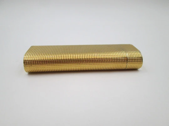 Cartier Paris butane lighter. Rhomboid decoration. Rolled gold. Swiss. 1990's