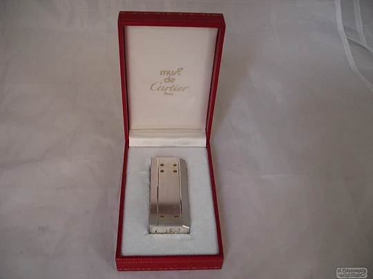 Cartier Santos butane lighter. Silver and gold plating. Paris