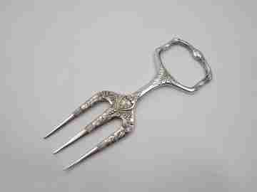 Carving fork. Electro plated nickel silver. Floral and vegetable motifs. 1940's. England