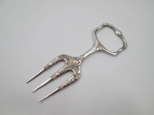 Carving fork. Electro plated nickel silver. Floral and vegetable motifs. 1940's. England