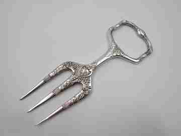 Carving fork. Electro plated nickel silver. Floral and vegetable motifs. 1940's. England