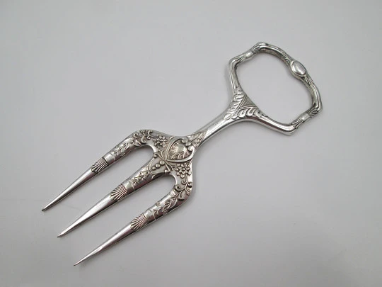 Carving fork. Electro plated nickel silver. Floral and vegetable motifs. 1940's. England