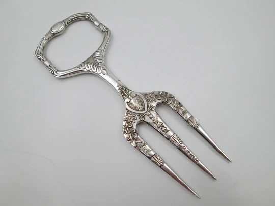 Carving fork. Electro plated nickel silver. Floral and vegetable motifs. 1940's. England