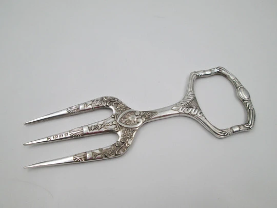 Carving fork. Electro plated nickel silver. Floral and vegetable motifs. 1940's. England