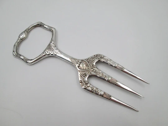 Carving fork. Electro plated nickel silver. Floral and vegetable motifs. 1940's. England