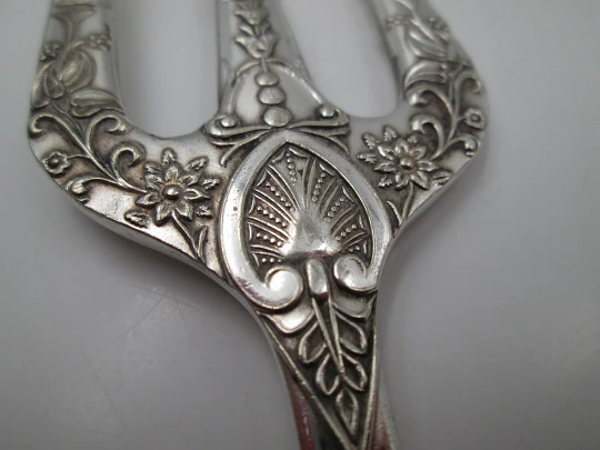 Carving fork. Electro plated nickel silver. Floral and vegetable motifs. 1940's. England