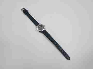 Cauny buceo mujer. Metal cromado y acero. Cuerda. Dial azul. 1960. Suiza