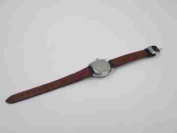 Cauny buceo mujer. Metal cromado y acero. Cuerda. Dial azul. 1960. Suiza