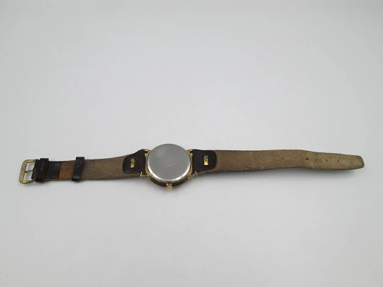 Cauny Darwil. Gold plated and steel. Manual wind. Calendar. Leather strap. 1970's. Swiss Cauny Darwil. Gold plated and steel. Manual wind. Calendar. Leather strap. 1970's. Swiss