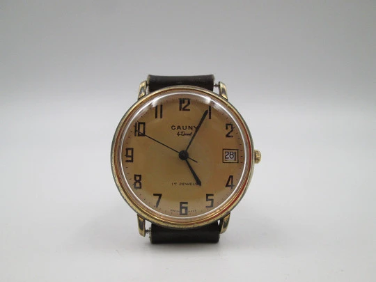 Cauny Darwil. Gold plated and steel. Manual wind. Calendar. Leather strap. 1970's. Swiss Cauny Darwil. Gold plated and steel. Manual wind. Calendar. Leather strap. 1970's. Swiss