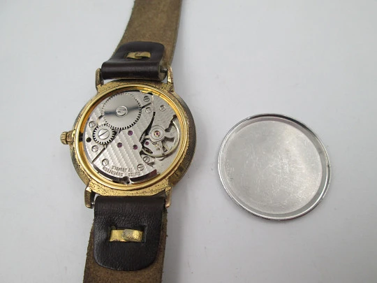 Cauny Darwil. Gold plated and steel. Manual wind. Calendar. Leather strap. 1970's. Swiss Cauny Darwil. Gold plated and steel. Manual wind. Calendar. Leather strap. 1970's. Swiss
