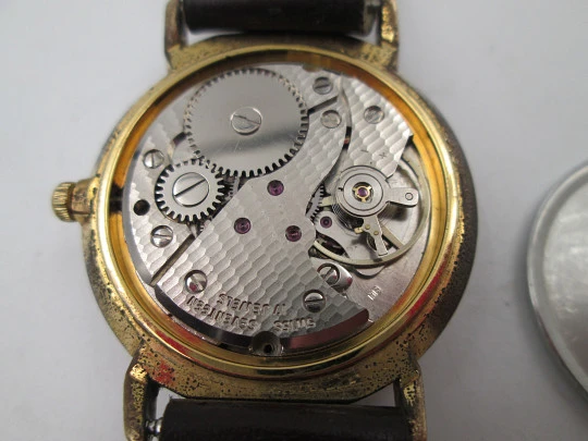 Cauny Darwil. Gold plated and steel. Manual wind. Calendar. Leather strap. 1970's. Swiss Cauny Darwil. Gold plated and steel. Manual wind. Calendar. Leather strap. 1970's. Swiss