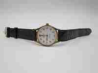 Cauny Elegance ladie's wristwatch. Quartz. Gold plated & steel. Strap. 1980's