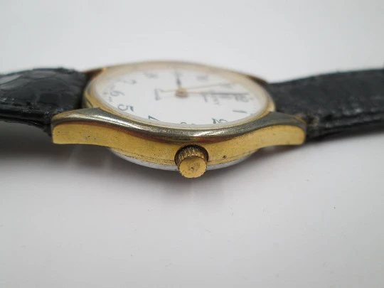 Cauny Elegance ladie's wristwatch. Quartz. Gold plated & steel. Strap. 1980's